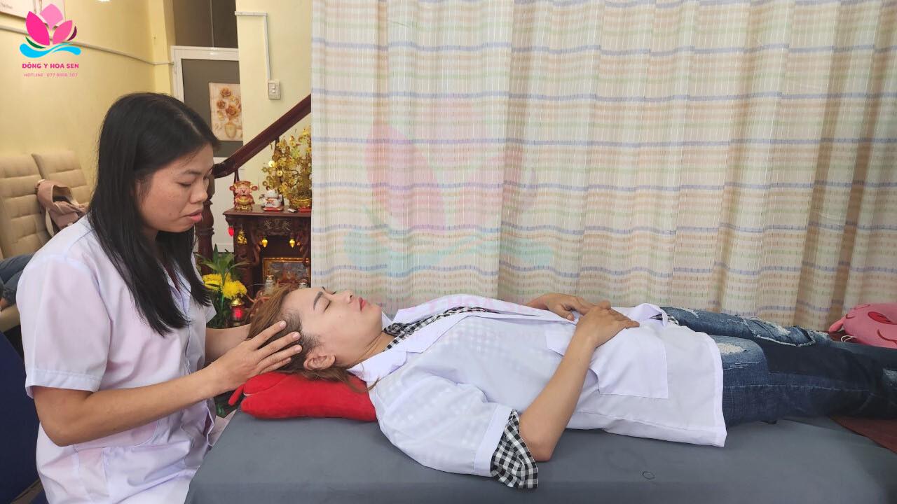 bấm huyệt trị đau đầu